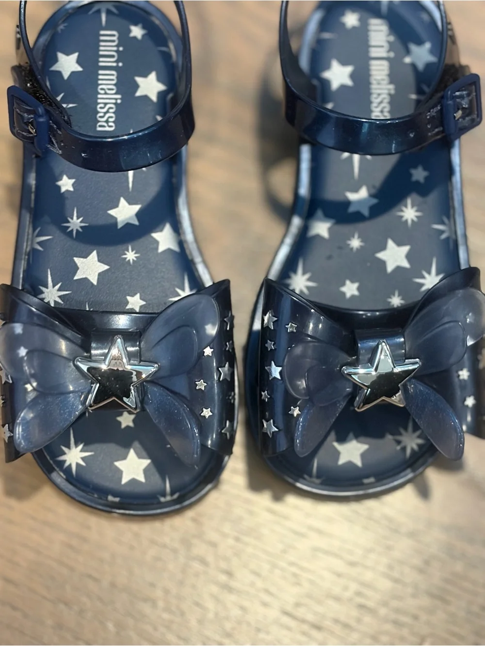 Mini Melissa Navy Star Jelly Sandals with Bow and Silver Star Accent. Never worn